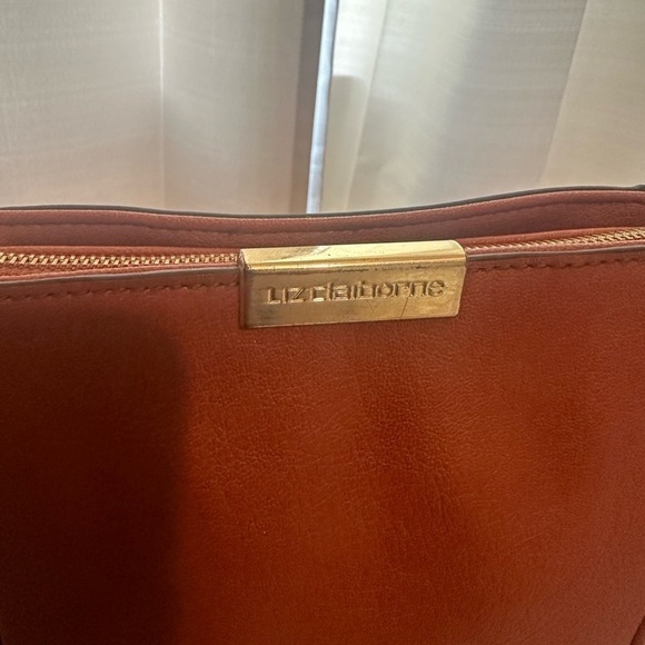 Liz Claiborne
Liz Claiborne purse - color is cognac New without tags - Picture 3 of 4